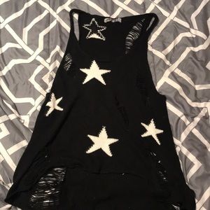 Sleeveless sweater. Black with white stars
